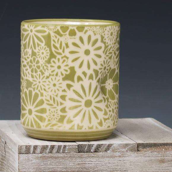 Bright green thumb rest cup-flowers