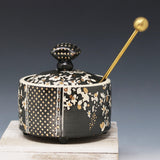 Honey pot-Black clay with porcelain flower pattern and gold accents