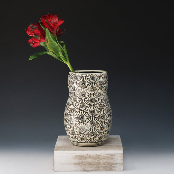 Vase-black clay with porcelain flower pattern and gold accents